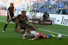 1. BL - Saison 2016/2017 - Hamburger SV - FC Ingolstadt 04 - Tobias Levels (#28 FCI) -Filip Kostic (#17 Hamburg) -  Moritz Hartmann (#9 FCI) - Foto: Meyer Jürgen