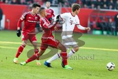 1. BL - Saison 2016/2017 - FC Ingolstadt 04 - FC Bayern München - Marcel Tisserand (#32 FCI) - Thomas Müller FC Bayern München weiss - Foto: Meyer Jürgen