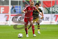 1. BL - Saison 2016/2017 - FC Ingolstadt 04 - Borussia Dortmund - Florent Hadergjonaj (#33 FCI) - Kagawa Shinji #23 gelb Dortmund - Foto: Meyer Jürgen