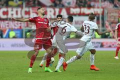 1. Bundesliga - Fußball - FC Ingolstadt 04 - FC Bayern - Lukas Hinterseer (16, FCI) Thiago (6 Bayern) Arturo Vidal (23 Bayern)