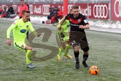 1. Bundesliga - Fußball - Testspiel - FC Ingolstadt 04 - 1. FC Heidenheim - Ronny Philp (HDH) und Robert Leipertz (13, FCI)