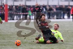 1. Bundesliga - Fußball - Testspiel - FC Ingolstadt 04 - 1. FC Heidenheim - Ryoma Watanabe (FCI)  wird von Sebastian Griesbeck von den Beinen geholt