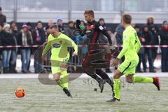 1. Bundesliga - Fußball - Testspiel - FC Ingolstadt 04 - 1. FC Heidenheim - mitte Lukas Hinterseer (16, FCI) links Arne Feick (HDH) und rechts Hauke Wahl (HDH)