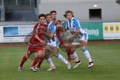 1. Bundesliga - Fußball - FC Ingolstadt 04 - Huddersfield Town Football Club - Testspiel - links Lukas Gerlspeck und 2. von rechts Romain Brégerie (18, FCI) in der Abwehr