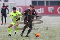 1. Bundesliga - Fußball - Testspiel - FC Ingolstadt 04 - 1. FC Heidenheim - links Dave Gnaase (HDH) rechts Max Christiansen (19, FCI)