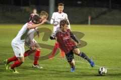 Regionalliga Bayern - FC Ingolstadt 04 II - FC Augsburg II - rechts Ryoma Watanabe (17) und links Marco Schuster (FCA) und Marvin Friedrich (FCA)