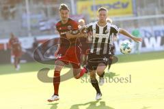 2. Bundesliga - Fußball - SV Sandhausen - FC Ingolstadt 04 - 1:0 - Zweikampf in der Abendsonne Stefan Kutschke (20, FCI) Knipping, Tim (34 SV)