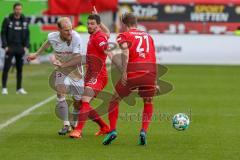 2. BL - Saison 2017/2018 - FC Heidenheim - FC Ingolstadt 04 - Tobias Levels (#3 FCI) - Norman Theuerkauf (#30 Heidenheim) - Maximilian Thiel (#21 Heidenheim) - Foto: Meyer Jürgen