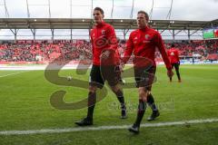 2. BL - Saison 2017/2018 - FC Ingolstadt 04 - Fortuna Düsseldorf -Stefan Kutschke (#20 FCI) und Marcel Gaus (#19 FCI) verlässt das Spielfeld nach dem warm machen -  Foto: Meyer Jürgen