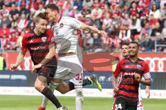 2. Bundesliga - Fußball - FC Ingolstadt 04 - 1. FC Nürnberg - Tobias Schröck (21, FCI) und Georg Margreitter (33 FCN) Kopftreffer