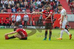 2. BL - Saison 2017/2018 - FC Ingolstadt 04 -1. FC Nürnberg - Christian Träsch (#28 FCI) verletzt am Boden - Almog Cohen (#8 FCI) reklamiert beim Schiedsrichter - Foto: Meyer Jürgen