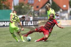 2. Bundesliga - Fußball - Testspiel - FC Ingolstadt 04 - SV Wehen Wiesbaden - Sebastian Mrowca (WW) und Tobias Schröck (21, FCI)