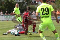 2. Bundesliga - Fußball - Testspiel - FC Ingolstadt 04 - SV Wehen Wiesbaden - Torwart Markus Kolke (WW) stoppt Antonio Colak (7, FCI) vor dem Tor, hinten Steven Ruprecht (WW)