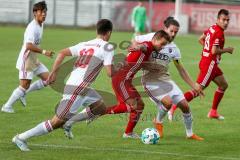 Regionaliga Bayern 2017/18 - FC Ingolstadt 04 II - FC Memmingen - Kotzge Jonatan #6 weiss FCI - Buchmann Tim rot Memmingen - Rizzo Gianluca Mario  weiss #10 FCI -  Foto: Jürgen Meyer