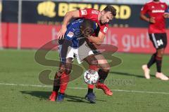 2. BL - Saison 2018/2019 - Holstein Kiel - FC Ingolstadt 04 - Benedikt Gimber (#5 FCI) im Zweikampf mit David Kinsombi (#6 Kiel) - Foto: Meyer Jürgen