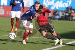 2. BL - Saison 2018/2019 - Holstein Kiel - FC Ingolstadt 04 - Paulo Otavio (#6 FCI) im Zweikampf mit Jannik Dehm (#20 Kiel) - Foto: Meyer Jürgen