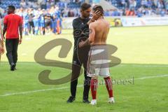 2. Bundesliga - Fußball - 1. FC Magdeburg - FC Ingolstadt 04 - Spiel ist aus, unentschieden 1:1, Spieler bedanken sich bei den mitgereisten Fans, Cheftrainer Stefan Leitl (FCI) redet mit Thomas Pledl (30, FCI)