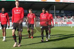2. BL - Saison 2018/2019 - Holstein Kiel - FC Ingolstadt 04 - Die Spieler verlassen nach dem warm machen das Spielfeld - Phil Neumann (#26 FCI) - Marvin Matip (#34 FCI) - Benedikt Gimber (#5 FCI) - Osayamen Osawe (#14 FCI)  - Foto: Meyer Jürgen