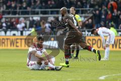 2. Bundesliga - FC St. Pauli - FC Ingolstadt 04 - Spiel ist aus, Sieg für Pauli 1:0, Christopher Avevor (6 Pauli) jubelt, Mergim Mavraj (15, FCI) am Boden, rechts Cenk Sahin (17, FCI)