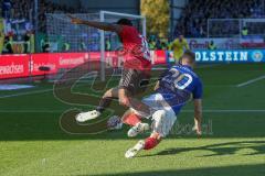 2. BL - Saison 2018/2019 - Holstein Kiel - FC Ingolstadt 04 - Osayamen Osawe (#14 FCI) im Zweikampf mit Jannik Dehm (#20 Kiel) - Foto: Meyer Jürgen