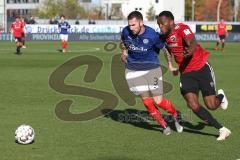 2. BL - Saison 2018/2019 - Holstein Kiel - FC Ingolstadt 04 - Osayamen Osawe (#14 FCI) - Dominik Schmidt (#3 Kiel) - Foto: Meyer Jürgen