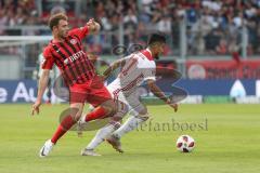2. Bundesliga - Fußball - SV Wehen Wiesbaden - FC Ingolstadt 04 - Maximilian Dittgen (7 SVW) versucht Darío Lezcano (11, FCI) zu stoppen