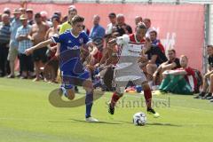 2. Bundesliga - Fußball - Testspiel - FC Ingolstadt 04 - SpVgg Unterhaching - Luca Hufnagel und rechts Konstantin Kerschbaumer (7, FCI)