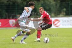 2. Bundesliga - Fußball - FC Ingolstadt 04 - Testspiel - FC Wacker Innsbruck - rechts Nico Rinderknecht (38 FCI) links Albert Vallci (Wacker)