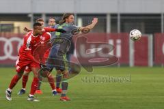 2. Bundesliga - Testspiel - FC Ingolstadt 04 - Hallescher FC - Kampf um den Ball Björn Paulsen (4, FCI) und Marvin Ajani (22)links