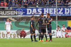 DFB-Pokal - SC Paderborn 07 - FC Ingolstadt 04 - Spiel ist aus, Paderborn gewinnt 2:1, mitte Torwart Marco Knaller (16, FCI) vorne feiert Paderborn, links Robert Leipertz (13, FCI) rechts Lucas Galvao (3 FCI) Benedikt Gimber (5, FCI)