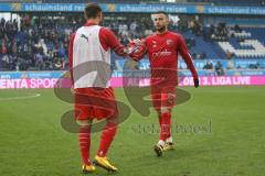 3. Fußball-Liga - Saison 2019/2020 - MSV Duisburg - FC Ingolstadt 04 - Die Spieler verlassen nach dem warm machen das Spielfeld - Robin Krausse (#23,FCI)  - Fatih Kaya (#9,FCI) - Foto: Meyer Jürgen