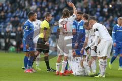 3. Liga - 1. FC Magdeburg - FC Ingolstadt 04 - Fatih Kaya (#9,FCI)  verletzt am Boden - Beister Maximilian (#10,FCI) - Leon Bell Bell (#19 Magdeburg) - Björn Paulsen (#4,FCI)  - Foto: Jürgen Meyer