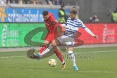 3. Fußball-Liga - Saison 2019/2020 - MSV Duisburg - FC Ingolstadt 04 - Fatih Kaya (#9,FCI)  - Ahmet Engin (#9 Duisburg) - Foto: Meyer Jürgen