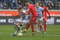 3. Fußball-Liga - Saison 2019/2020 - MSV Duisburg - FC Ingolstadt 04 - Fatih Kaya (#9,FCI)  - Joshua Bitter (#23 Duisburg) -  - Foto: Meyer Jürgen