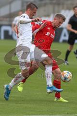 3. Fußball-Liga - Saison 2019/2020 - Bayern München II - FC Ingolstadt 04 - Stefan Kutschke (#30,FCI)  - Lars Lukas Mai (#15 München) - Foto: Meyer Jürgen