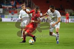 3. Liga - Fußball - FC Ingolstadt 04 - SpVgg Unterhaching - Stefan Kutschke (30, FCI) Zweikampf Greger Christoph (15, SpVgg)