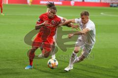 3. Fußball-Liga - Saison 2019/2020 - FC Ingolstadt 04 -  SpVgg Unterhaching - Ganiggia Ginola Elva (#14,FCI)  - Sascha Bigalke (#21 Unterhaching) - Max Dombrowka (#8 Unterhaching) - Foto: Meyer Jürgen