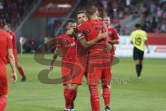 Im Bild: Fatih Kaya (#9 FC Ingolstadt) und Stefan Kutschke (#30 FC Ingolstadt) umarmen sich - Robin Krauße (#23 FC Ingolstadt) kommt im Hintergrund dazu

Fussball - 3. Bundesliga - Ingolstadt - Saison 2019/2020 - FC Ingolstadt 04 - Würzburger Kickers - 