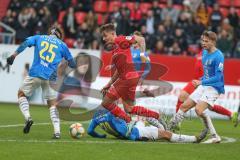 3. Fußball-Liga - Saison 2019/2020 - FC Ingolstadt 04 - Carl Zeiss Jena - Dennis Eckert Ayensa (#7,FCI)  - Justin Schau (#25 Jena) - Manuel Maranda (#30 Jena) - Foto: Meyer Jürgen