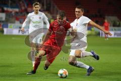 3. Liga - Fußball - FC Ingolstadt 04 - SpVgg Unterhaching - Stefan Kutschke (30, FCI) Zweikampf Greger Christoph (15, SpVgg)