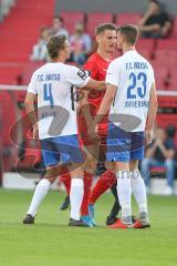 3. Fußball-Liga - Saison 2019/2020 - FC Ingolstadt 04 - Hansa Rostock - Stefan Kutschke (#30,FCI) redet mit Sven Sonnenberg (#23 Rostock) nachdem er gefoult wurde  - Foto: Meyer Jürgen