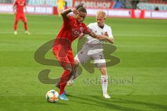 3. Fußball-Liga - Saison 2019/2020 - FC Ingolstadt 04 -  SpVgg Unterhaching - Ganiggia Ginola Elva (#14,FCI)  - Sascha Bigalke (#21 Unterhaching) - Foto: Meyer Jürgen