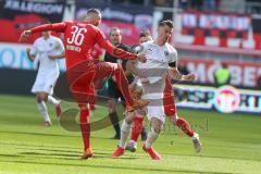 3. Fußball-Liga - Saison 2019/2020 - FC Ingolstadt 04 - Victoria Köln - Stefan Kutschke (#30,FCI)  - Dominik Lanius (#36 Köln) - Foto: Meyer Jürgen