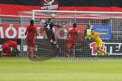 3. Fußball-Liga - Saison 2019/2020 - FC Ingolstadt 04 - KFC Uerdingen - Torwart Fabijan Buntic (#24,FCI)  - Jan Kirchhoff (#4 Uerdingen) - Robin Krausse (#23,FCI)  - Foto: Meyer Jürgen