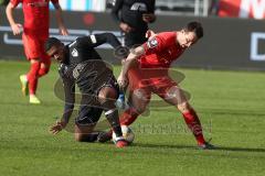 3. Fußball-Liga - Saison 2019/2020 - FC Ingolstadt 04 - KFC Uerdingen - Peter Kurzweg (#16,FCI)  - Frank Evina (#18 Uerdingen) - Foto: Meyer Jürgen