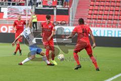 3. Liga - Fußball - FC Ingolstadt 04 - Hansa Rostock - Nils Butzen (Rostock 16) Thomas Keller (27, FCI) Caniggia Ginola Elva (14, FCI)