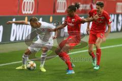 3. Fußball-Liga - Saison 2019/2020 - FC Ingolstadt 04 -  SpVgg Unterhaching - Ganiggia Ginola Elva (#14,FCI)  - Felix Schröter (#29 Unterhaching) - Foto: Meyer Jürgen