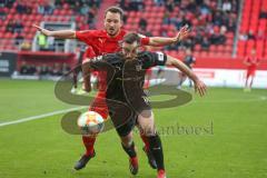 3. Fußball-Liga - Saison 2019/2020 - FC Ingolstadt 04 - FSV Zwickau - Peter Kurzweg (#16,FCI)  - Morris Schröter (#17 Zwickau) - Foto: Meyer Jürgen