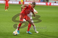 3. Fußball-Liga - Saison 2019/2020 - FC Ingolstadt 04 -  SpVgg Unterhaching - Ganiggia Ginola Elva (#14,FCI)  - Sascha Bigalke (#21 Unterhaching) - Foto: Meyer Jürgen