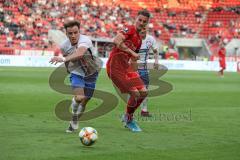 3. Liga - Fußball - FC Ingolstadt 04 - Hansa Rostock - mitte Stefan Kutschke (30, FCI) links Mirnes Pepic (Rostock 6)